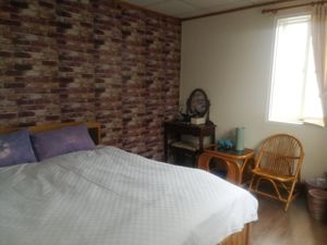 interior of standard room at Shān Shuǐ Yuán 水緣蔬食民宿 in Ren Ai