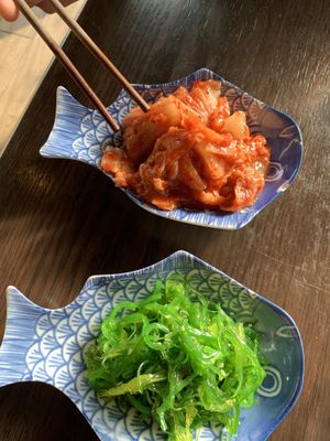 Kimchi and seaweed salad.   Delicious!! at Chi in Vancouver