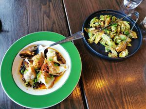 Spicy truffle shrimp wontons and Brussels sprouts at Chi in Vancouver