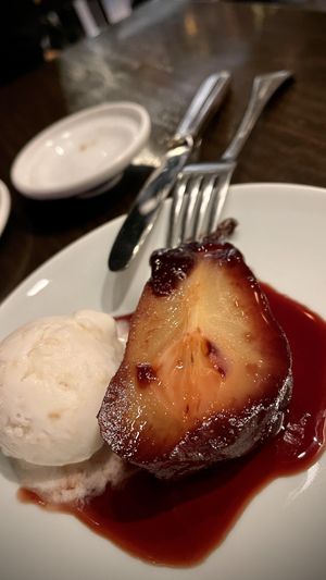 Poached pear w coco ice cream  at Chi in Vancouver