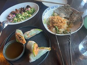 Mushroom skewers, pomelo salad, and vegetable rolls    at Chi in Vancouver