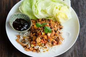 Duk Lettuce Wrap - Jackfruit, tofu, mushroom, jicama, carrots, hoisin, puffed rice noodles, nori  at Chi in Vancouver
