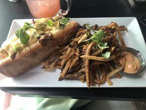 (New) Philly cheese steak and fries. Always order the the Chipotle aioli dip!  at Neon Tiger in Charleston