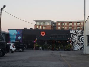 Some outdoor seating in front at Neon Tiger in Charleston