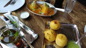 samosas at the top and batata vada on the right at Hodu Hakatna - Little India in Beer Sheva