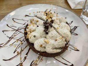 Absolutely incredible chocolate caramel earl grey tart!!  at The Park by Years in Kowloon