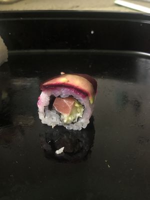 Rainbow roll with salmon, mayo and thin slices of sweet potato, avocado and beetroot at Geisha House in Birmingham
