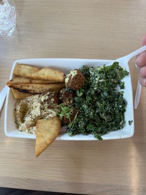 Falafel plate with kale, hummus, and pita bread   at Vessel Kitchen in Salt Lake City