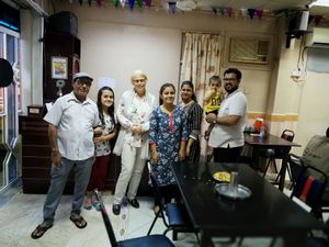 With the owner's family.  at Milan Restaurant in Sohar