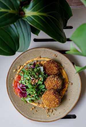 TOP! Draniki aka potato pancakes with house made kimchi mayo and lecho at Commune Cafe in Tallinn