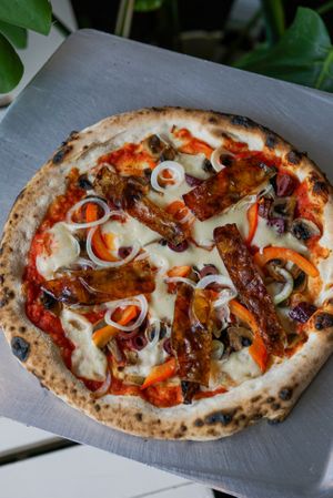 Pablo. Vegan BACON PIZZA at Commune Cafe in Tallinn