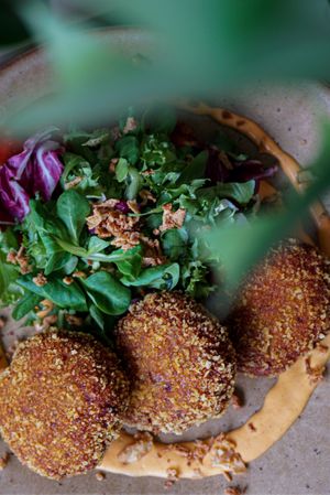 TOP! Draniki aka potato pancakes with house made kimchi mayo and lecho at Commune Cafe in Tallinn