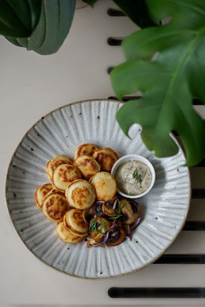 Pancakes with truffle mayo and mushrooms at Commune Cafe in Tallinn