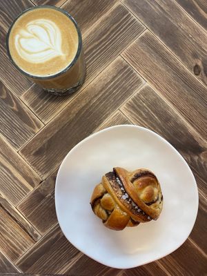 Bun and coffee at Commune Cafe in Tallinn