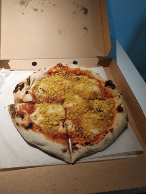 4 CHEESE pizza at Commune Cafe in Tallinn