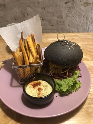 Mushroom burger in charcoal bun  at iVegan Supershop Westlake Hanoi - Healthy Plant Based Cafe in Hanoi