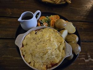 Pie with tomato sauce and potatoes at PIE in Lagos