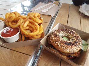 Utiwai bagel and curly fries at Get Fixed Bicycle Cafè in Porirua