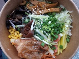 All the goodies of the vegan ramen, the soup is in a separate cup so that you can add it 'a la minute' at Cudo Vegan Sushi in Poznan