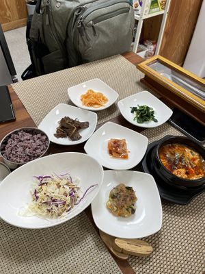 Spicy tofu stew with so many sides   at Soban Vegan 소반 비건식당 in Busan