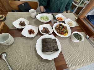 Rice wrapped in lotus leaf + soup and side dishes; fried shitake mushrooms with sweet and sour sauce  at Soban Vegan 소반 비건식당 in Busan