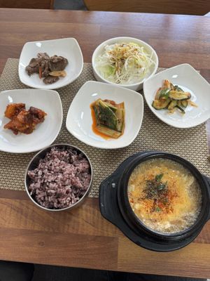 Spicy soft tofu soup and sides  at Soban Vegan 소반 비건식당 in Busan