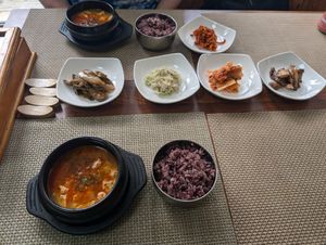 Two portions of tofu stew and banchan at Soban Vegan 소반 비건식당 in Busan
