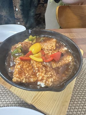 Popped rice in sweet and sour sauce - served bubbling!  at Soban Vegan 소반 비건식당 in Busan