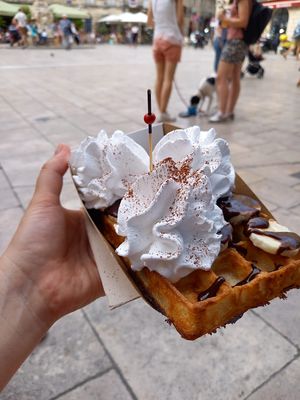 Vegan waffle and chantilly with banana slices and chocolate sauce at Jolly Chocolat in Bordeaux