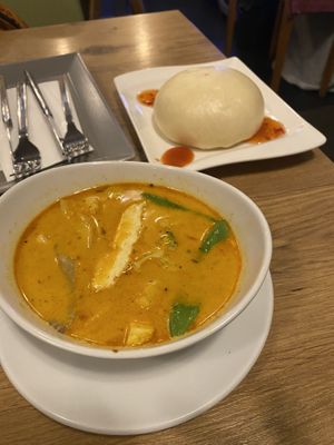 Appetizers: coconut milk soup and bao  at Vevi in Vienna