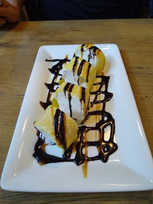 Eispalatschinke - French crepe style dough filled with ice-cream at Vevi in Vienna