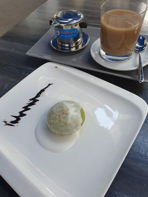 Green tea rice cake with coconut sauce at Vevi in Vienna
