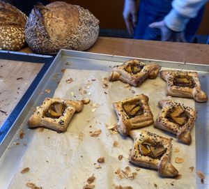 Sourdough bread (nice) and puffed pastries with sweet potato and sesame seeds (tasty, but on the salty side) at Loaf Sourdough Bakery in Utrecht
