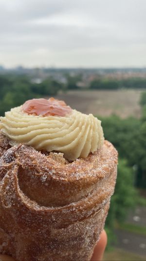 Peach and almond cruffin. Very flaky, delicious cream!  at Loaf Sourdough Bakery in Utrecht