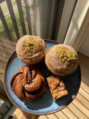 Pistachio cruffin, cinnamon bun, brookie. All delicious     at Loaf Sourdough Bakery in Utrecht