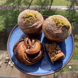 Pistachio cruffin, cinnamon bun, brookie. All delicious.    at Loaf Sourdough Bakery in Utrecht