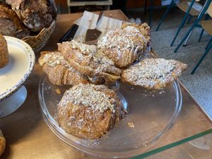 Almond croissants: tasty with a rich almond flavour. There’s even an almond crunch on top.  at Loaf Sourdough Bakery in Utrecht
