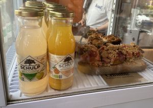 Schulp juices and slices of rhubarb crumble and brownie. The pieces are smaller than they used to be.  at Loaf Sourdough Bakery in Utrecht