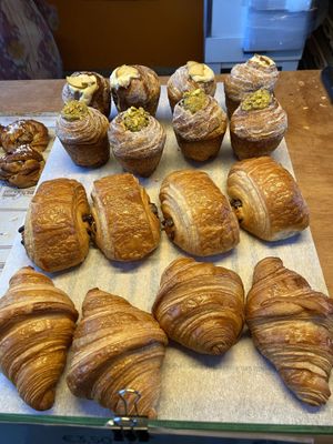 Thursday 3 Oct 2024: cruffins with stoofpeer (allright) and pistachio (the best), new-style pain au chocolat and croissant. at Loaf Sourdough Bakery in Utrecht
