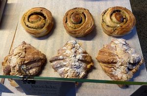 Olive/‘cheese’ croissant and almond croissant 18 Jan 2025 at Loaf Sourdough Bakery in Utrecht