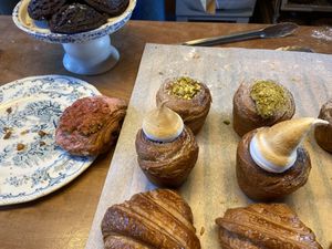 Some options on Friday 14 Feb 2025. The pink croissant is with hazelnut and chocolate for Valentine’s day.  at Loaf Sourdough Bakery in Utrecht