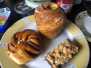 cinnamon bun, pistachio cruffin, hazelnut brookie  at Loaf Sourdough Bakery in Utrecht