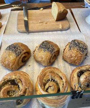 Orange cake with white chocolate, seitan roll and pesto roll: all tasty but the seitan roll is the best! at Loaf Sourdough Bakery in Utrecht