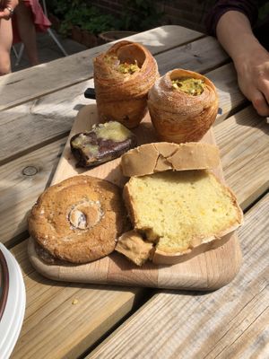 pistachio cruffin, brownie, cookie, orange white chocolate cake  at Loaf Sourdough Bakery in Utrecht