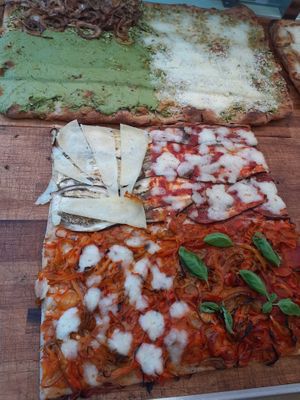 Pizza con peperoni e mozzarella, melanzane e pecorino e con mozzarella at Prima la Materia in Rome