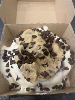 CYO with cream cheese frosting, chocolate chips and cookie dough.   at Cinnaholic in Gaithersburg