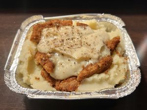 Country fried chicken with gravy and mashed potatoes  at Freakin' Vegan - Take Out & Delivery in Ridgewood
