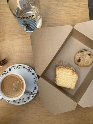 Almond cake cookie and organic coffee  at Amendūla Café in Paris