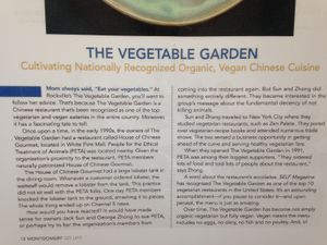 Sign on the entrance wall explaining Vegetable Gardens's origins at The Vegetable Garden in Silver Spring