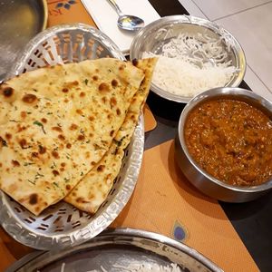 Garlic naan with baigan bartha at Krishna Vilas in Eindhoven